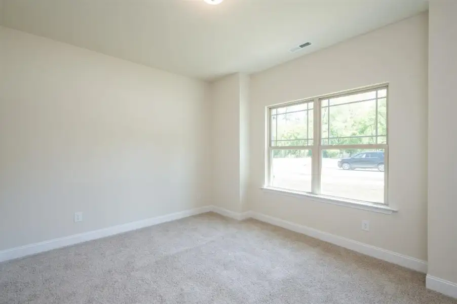 Representative unfurnished interior of a home built from the 1602-2 by Adams Homes in Ham Farm, La Grange (Image 23).