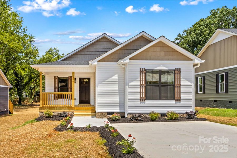 Front exterior of a new home in , Statesville, NC, highlighting curb appeal (Image 15). Front exterior of a new home in , Statesville, NC, highlighting curb appeal (Image 15).