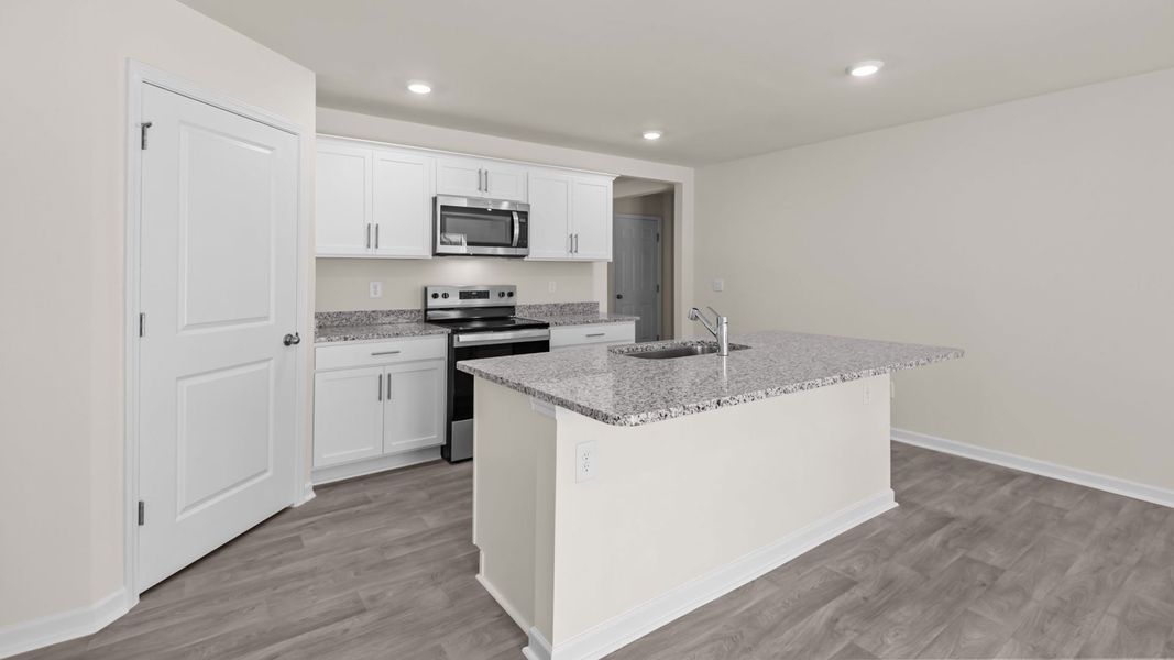 Furnished interior view inside a new home in Blair Ridge, La Grange (Image 5).