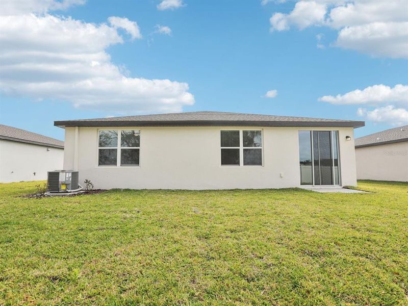Exterior details and patio area of a home in The Reserve at Van Oaks, Auburndale (Image 3).