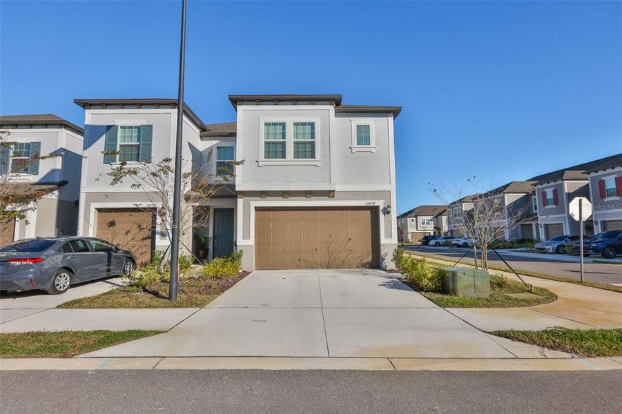 Front exterior of a new home in , Tampa, FL, highlighting curb appeal (Image 22).