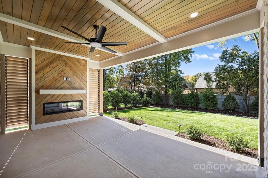 Gorgeous millwork on lanai with electric fireplace