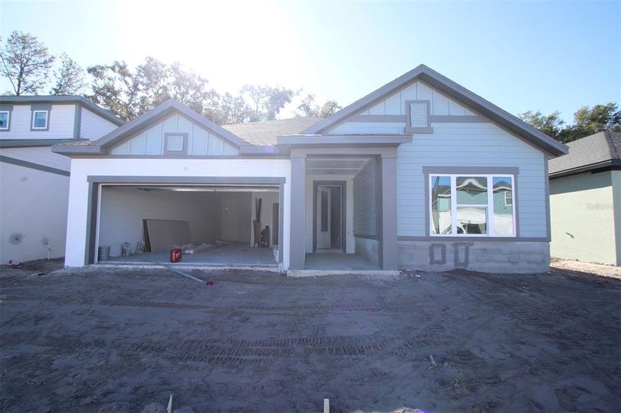 In-progress construction of a new home in Oakfield at Mount Dora Village Series, Mount Dora, FL (Image 4).