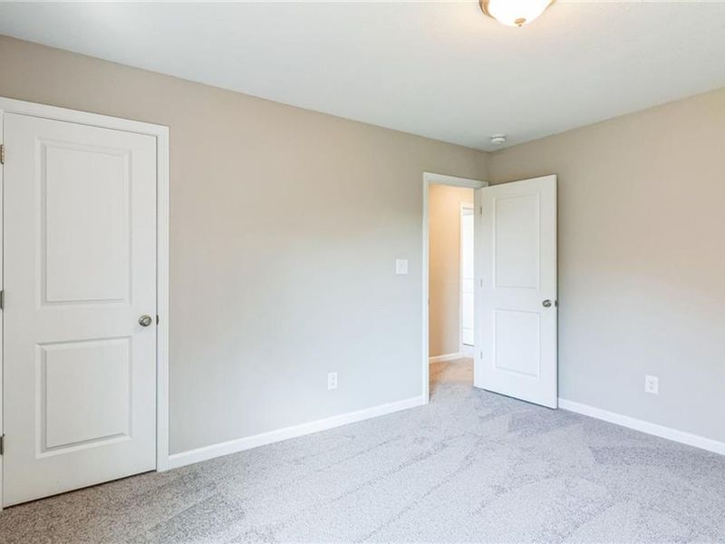 Spacious, unfurnished interior of a new home in Ivy Glen, Perry (Image 12).