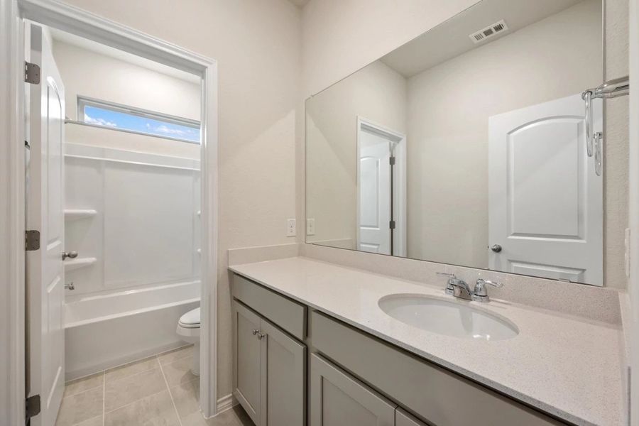 Furnished interior view inside a new home in The Cottages at Lariat, Liberty Hill (Image 33).