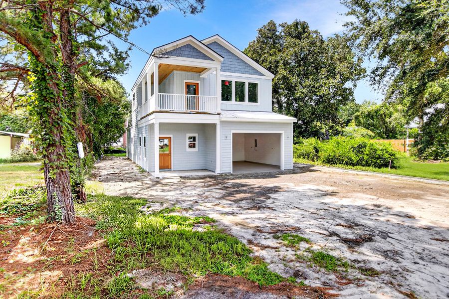 Front exterior of a new home in , Pinopolis, SC, highlighting curb appeal (Image 1). Front exterior of a new home in , Pinopolis, SC, highlighting curb appeal (Image 1).