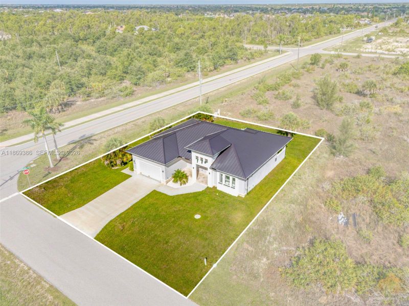 Front exterior of a new home in , Port Charlotte, FL, highlighting curb appeal (Image 24). Front exterior of a new home in , Port Charlotte, FL, highlighting curb appeal (Image 24).