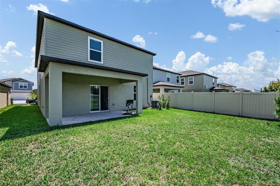 Exterior details and patio area of a home in Park East, Plant City (Image 24).
