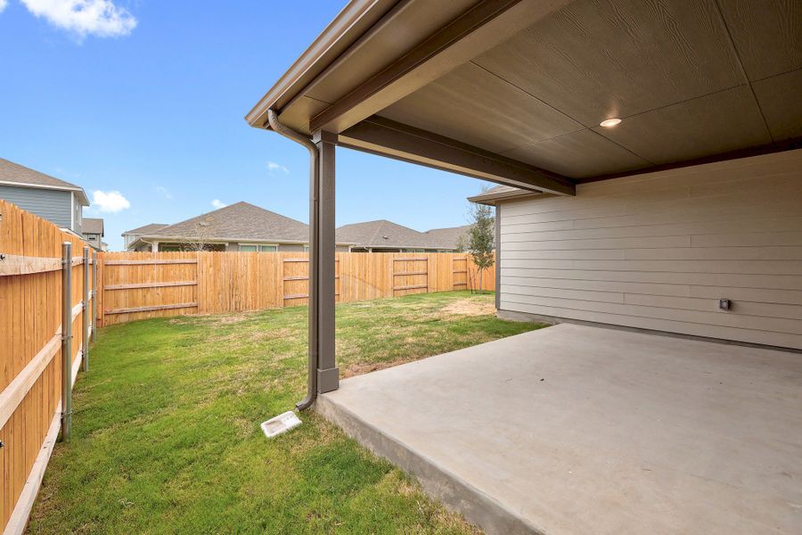 Exterior details and patio area of a home in Prairie Winds, Hutto (Image 3). Exterior details and patio area of a home in Prairie Winds, Hutto (Image 3).