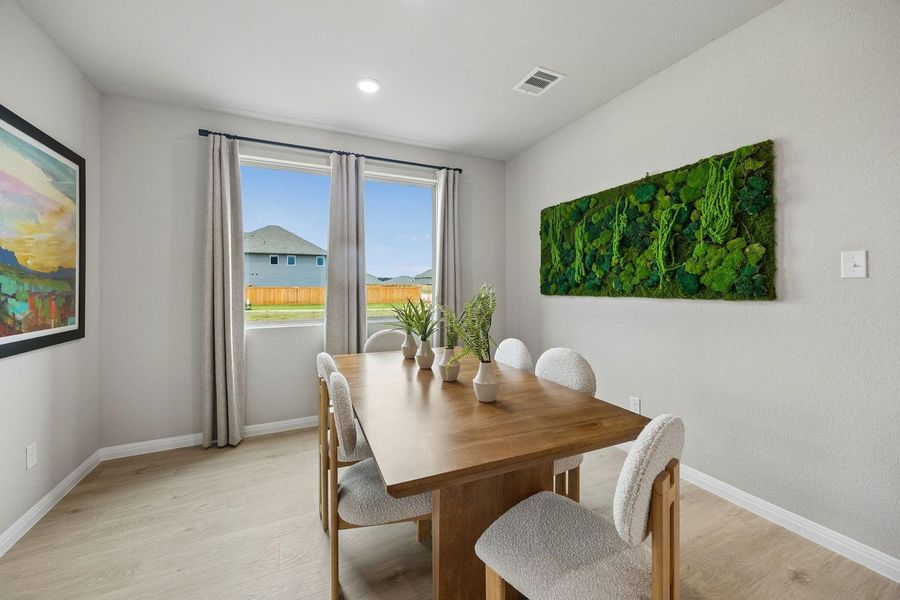 Dining Room in the Oak home plan by Trophy Signature Homes – REPRESENTATIVE PHOTO