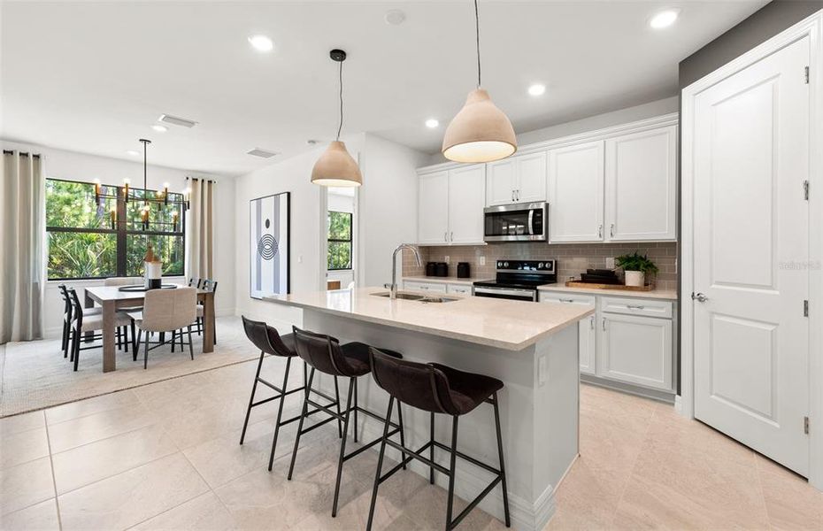 Furnished interior view inside a new home in The Strand at Cedar Grove, North Port (Image 6).