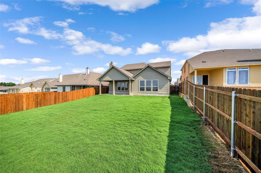 Front exterior of a new home in Liberty Pointe, Gainesville, TX, highlighting curb appeal (Image 20). Front exterior of a new home in Liberty Pointe, Gainesville, TX, highlighting curb appeal (Image 20).