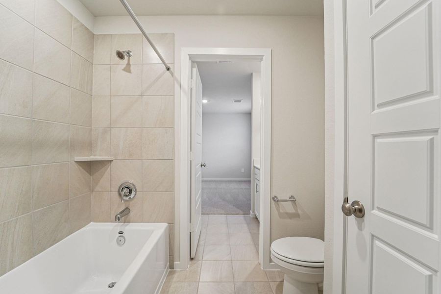 Furnished interior view inside a new home in Granger Pointe - Premier Series, Conroe (Image 12).