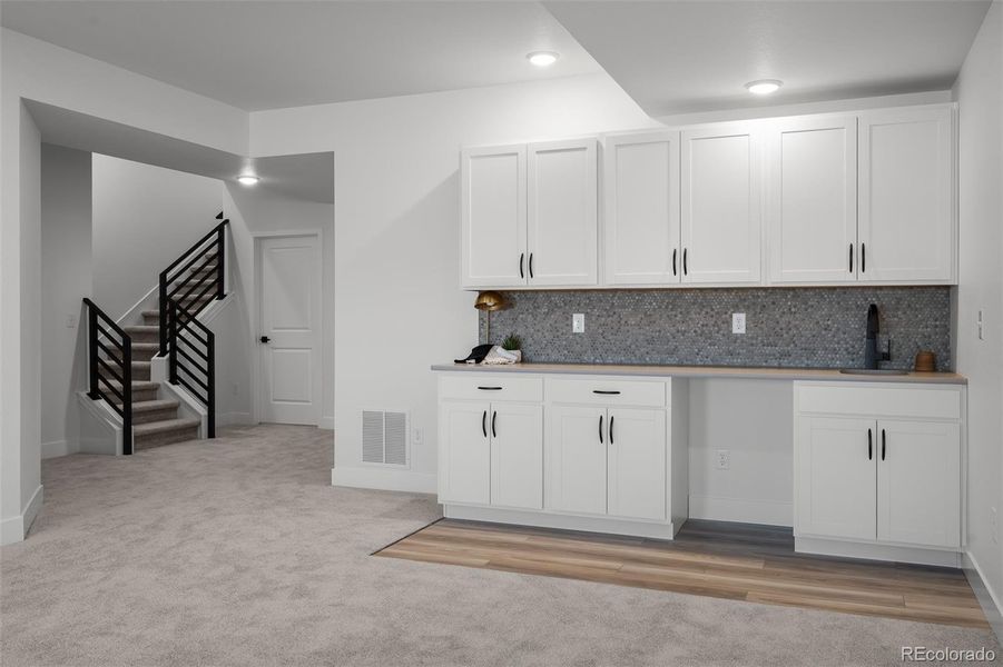 Furnished interior view inside a new home in Revel Crossing at Wolf Ranch - The Panorama Collection, Colorado Springs (Image 14).