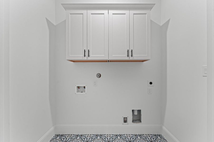 Laundry room. *Previous Brownstone Living project, selections and floor plans may vary.*