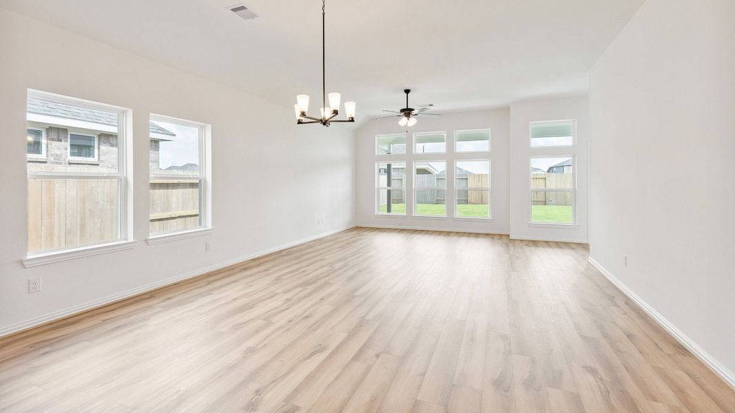 Furnished interior view inside a new home in Creekhaven, Iowa Colony (Image 15).