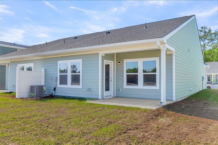 Exterior details and patio area of a home in , Ravenel (Image 18). Exterior details and patio area of a home in , Ravenel (Image 18).