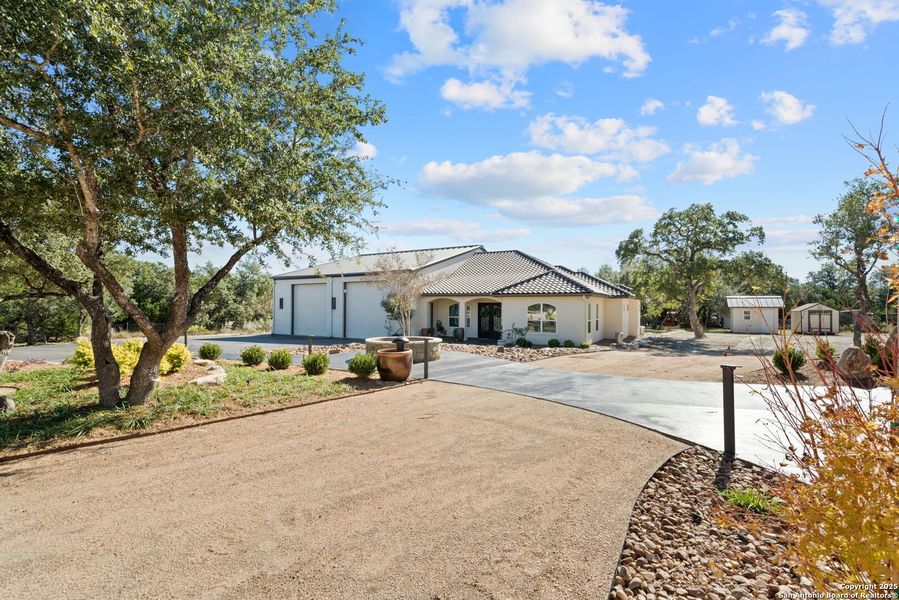 Front exterior of a new home in , Bulverde, TX, highlighting curb appeal (Image 28). Front exterior of a new home in , Bulverde, TX, highlighting curb appeal (Image 28).
