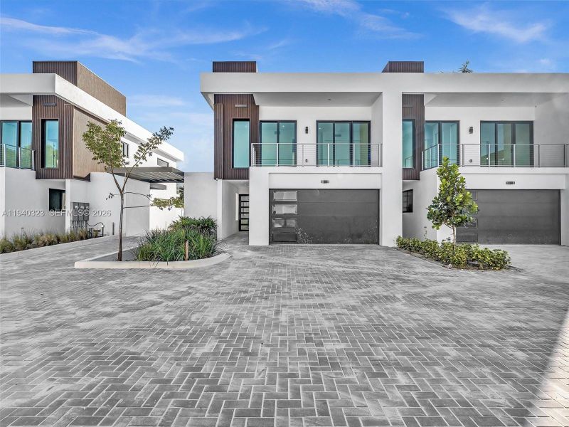 Front exterior of a new home in , Dania Beach, FL, highlighting curb appeal (Image 35).