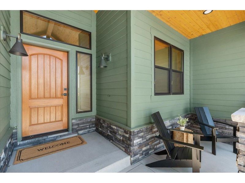 Exterior details and patio area of a home in Harvest Ridge, Berthoud (Image 28).