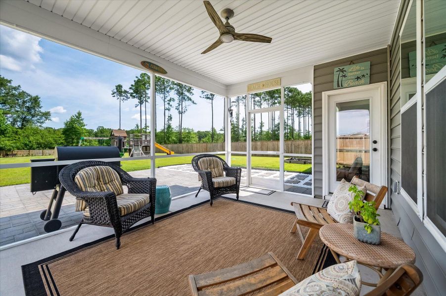 Exterior details and patio area of a home in The Enclave at French Quarter Creek, Huger (Image 24).