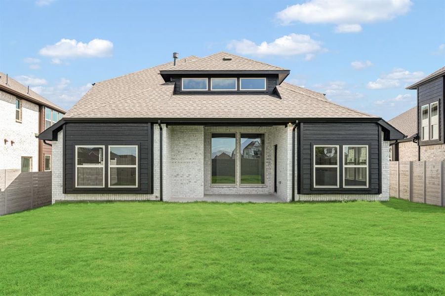 Front exterior of a new home in Painted Tree Woodland District 50, McKinney, TX, highlighting curb appeal (Image 26). Front exterior of a new home in Painted Tree Woodland District 50, McKinney, TX, highlighting curb appeal (Image 26).