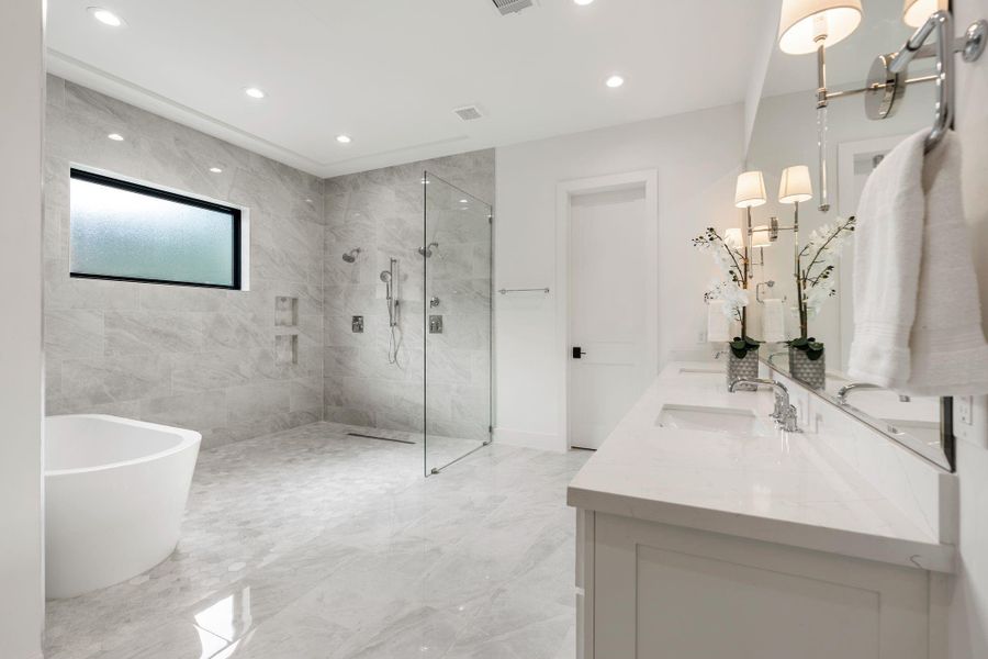Resort style no step primary bath with two large closets Resort style no step primary bath with two large closets