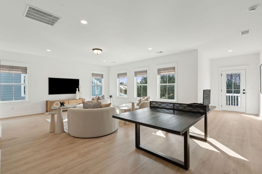 Furnished interior view inside a new home in Tidewater at Lakes of Cane Bay, Summerville (Image 28).