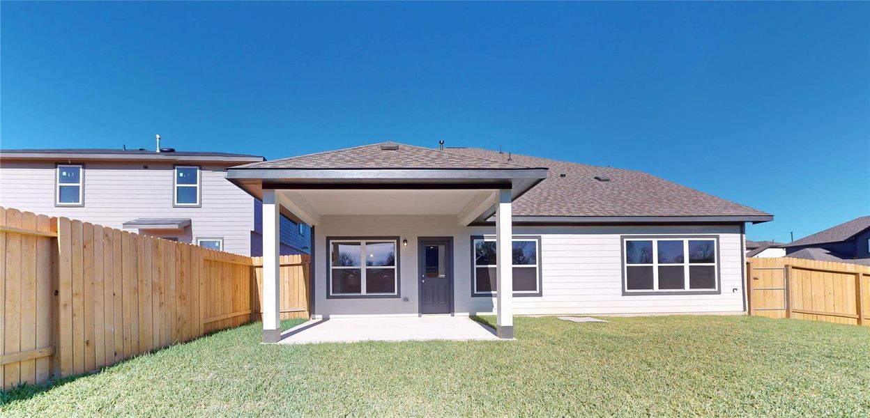 Exterior details and patio area of a home in Lexington Heights 50', Willis (Image 3).