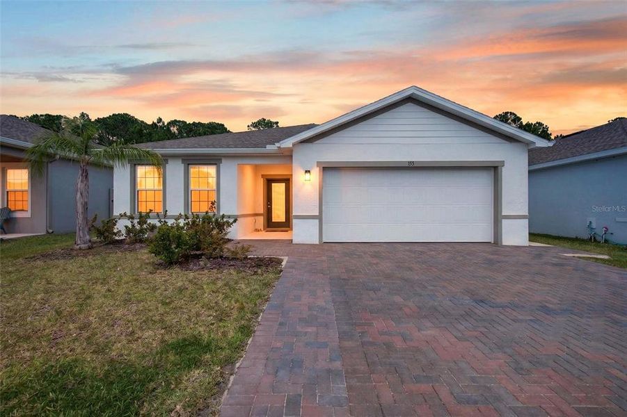 Front exterior of a new home in , Daytona Beach, FL, highlighting curb appeal (Image 29). Front exterior of a new home in , Daytona Beach, FL, highlighting curb appeal (Image 29).