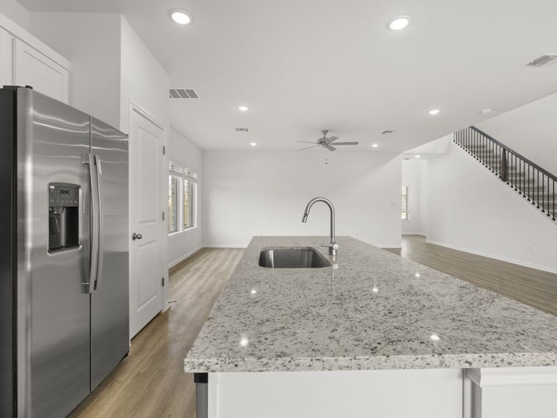 Furnished interior view inside a new home in Crosswinds, Kyle (Image 6).