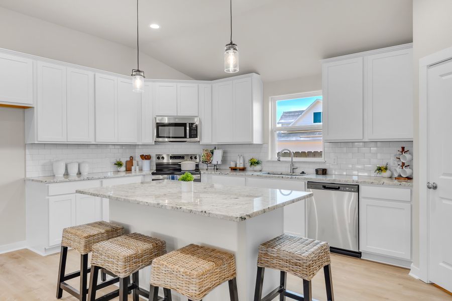Representative furnished interior of a home built from the The Poppy by Avonley Homes in Rudder Pointe, Bryan (Image 26).