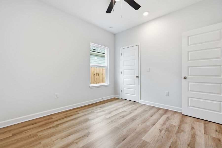 Spacious, unfurnished interior of a new home in Live Oak Cottages, Freeport (Image 19). Spacious, unfurnished interior of a new home in Live Oak Cottages, Freeport (Image 19).