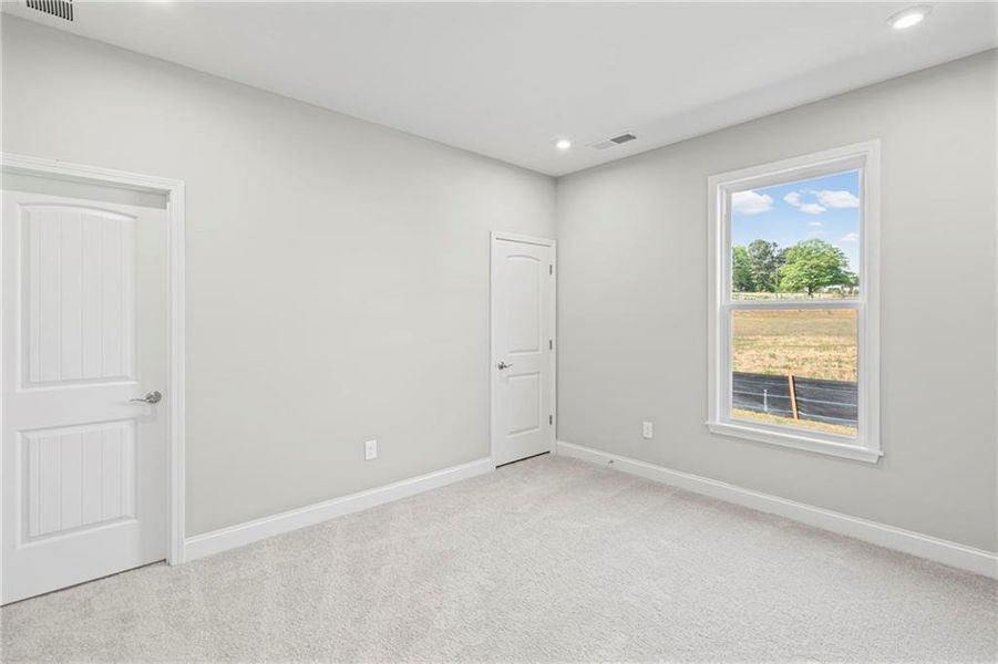 Spacious, unfurnished interior of a new home in Hidden Fields, Hoschton (Image 37). Spacious, unfurnished interior of a new home in Hidden Fields, Hoschton (Image 37).