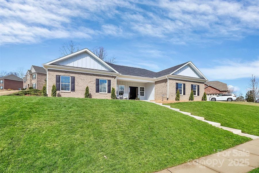 Front exterior of a new home in , Rock Hill, SC, highlighting curb appeal (Image 29).