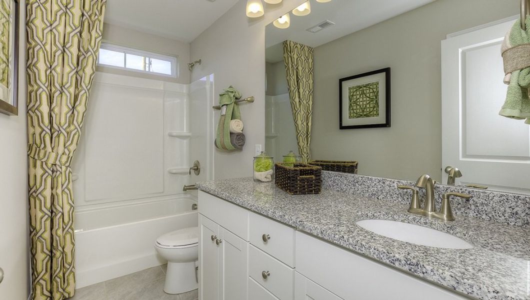 Representative furnished interior of a home built from the Carson by D.R. Horton in Townes at Tap Root Farms, Fletcher (Image 26).