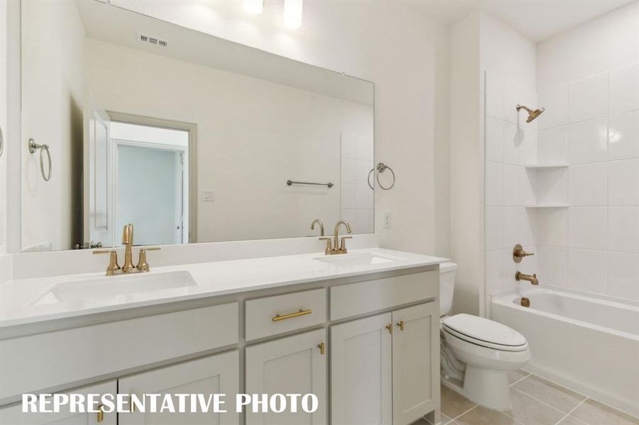 Guests will enjoy having their own vanity space in this lovely guest bathroom. Guests will enjoy having their own vanity space in this lovely guest bathroom.