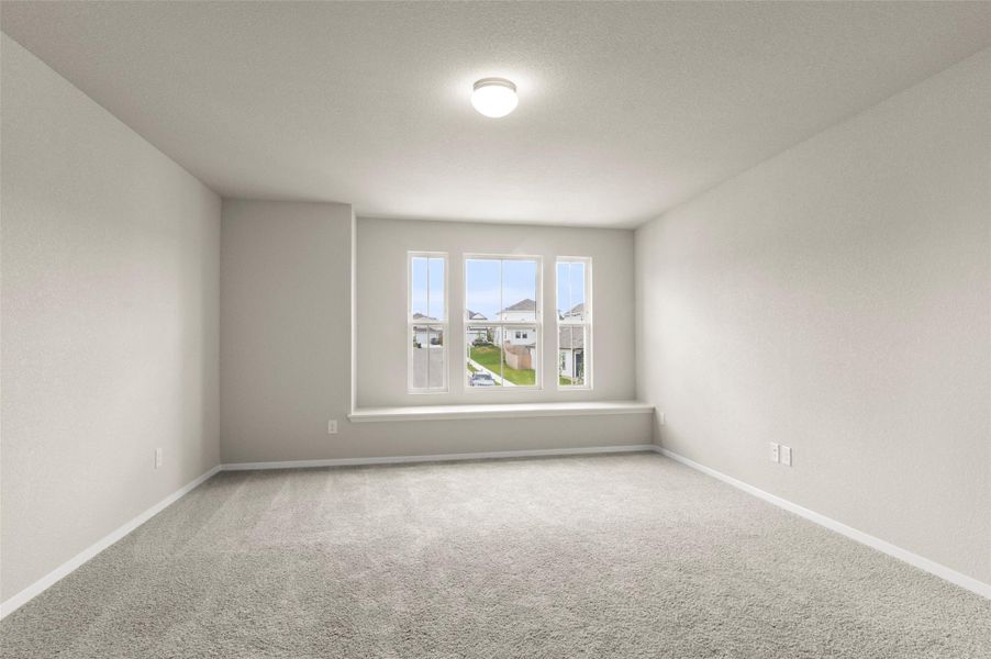 Spare room with carpet floors and baseboards