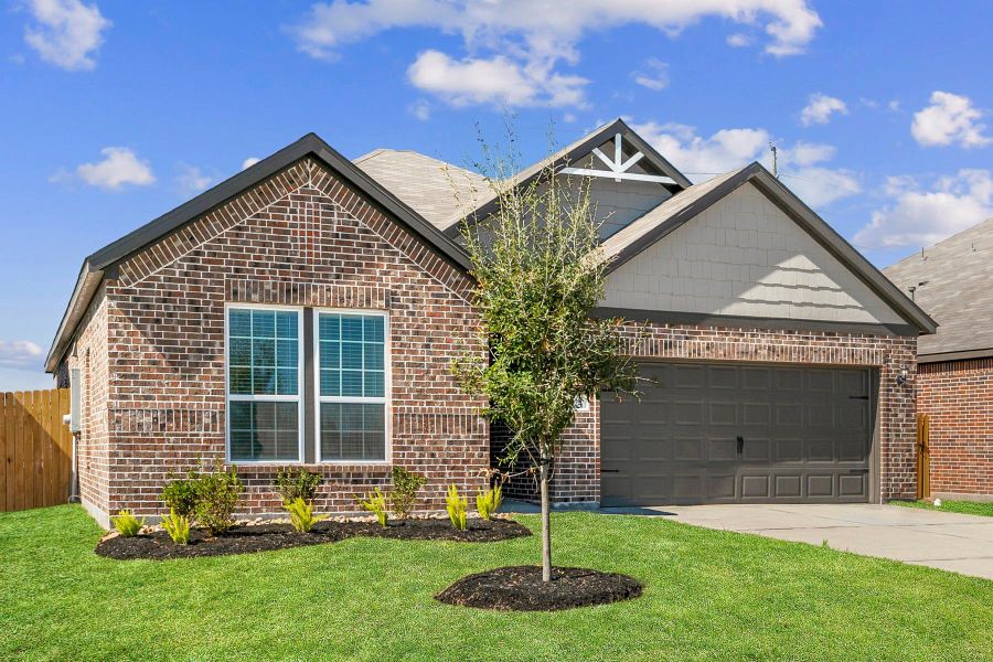 Front exterior of a new home in Freeman Ranch, Katy, TX, highlighting curb appeal (Image 1).