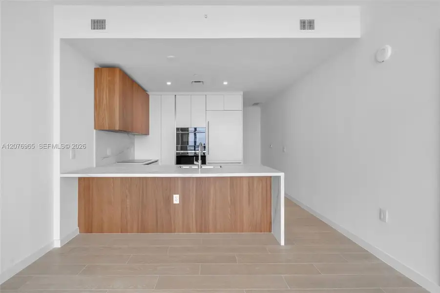 Furnished interior view inside a new home in , Miami (Image 9).