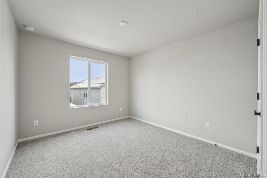 Spacious, unfurnished interior of a new home in The Villas Collection at Sterling Ranch, Littleton (Image 26).