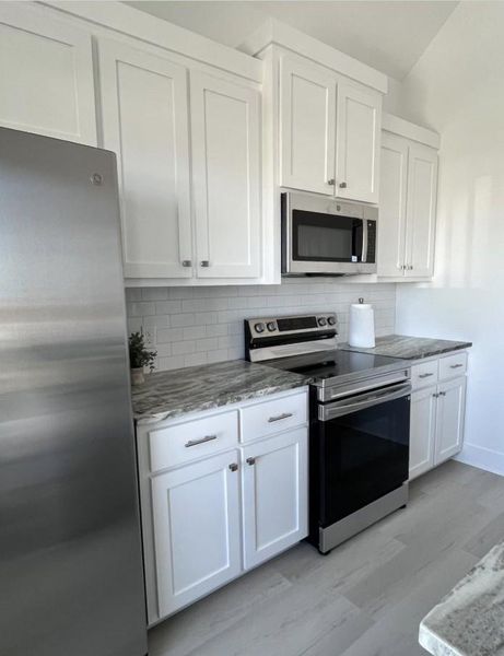 Furnished interior view inside a new home in , Crystal Beach (Image 8).