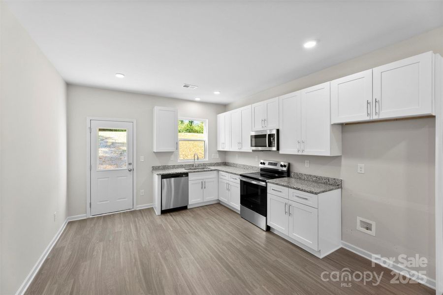 Furnished interior view inside a new home in , Spencer (Image 5). Furnished interior view inside a new home in , Spencer (Image 5).