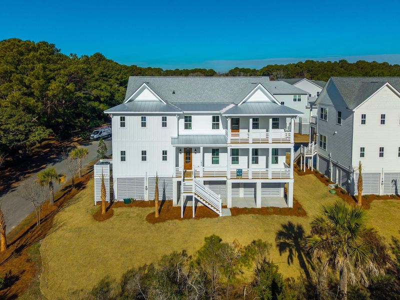 Exterior details and patio area of a home in Overlook at Copahee Sound, Awendaw (Image 46).