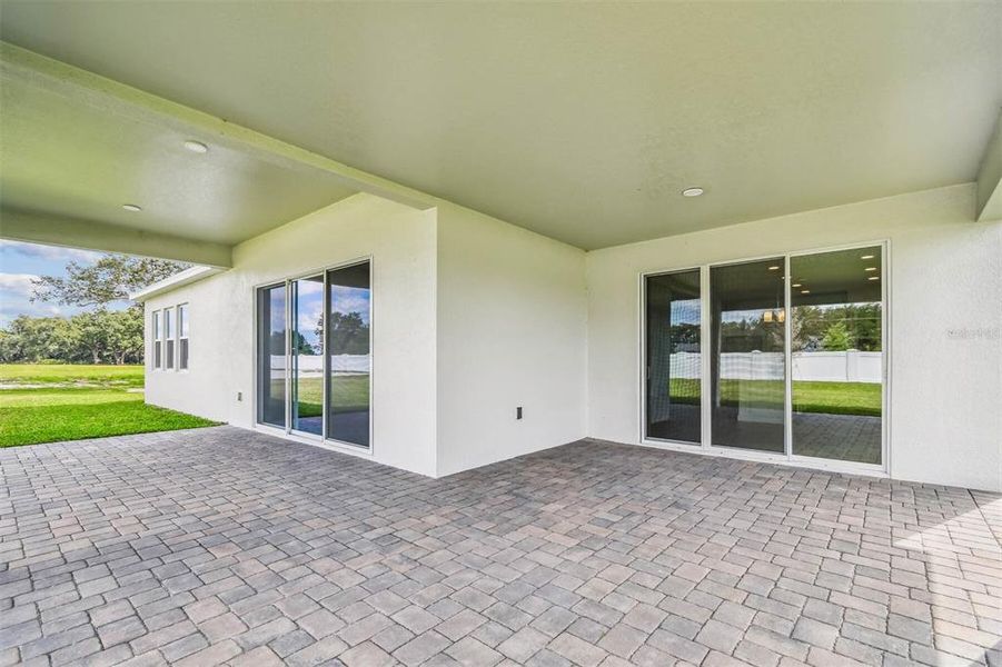 Exterior details and patio area of a home in Solace at Corner Lake, Orlando (Image 45).