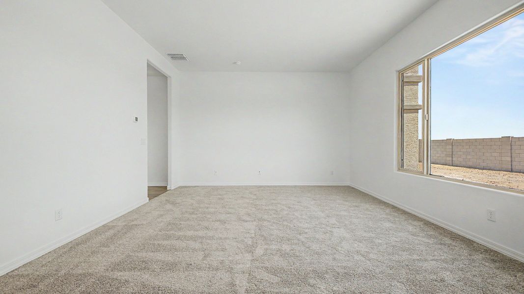 Representative furnished interior of a home built from the Granada by DRB Homes in Windrose, Waddell (Image 12).