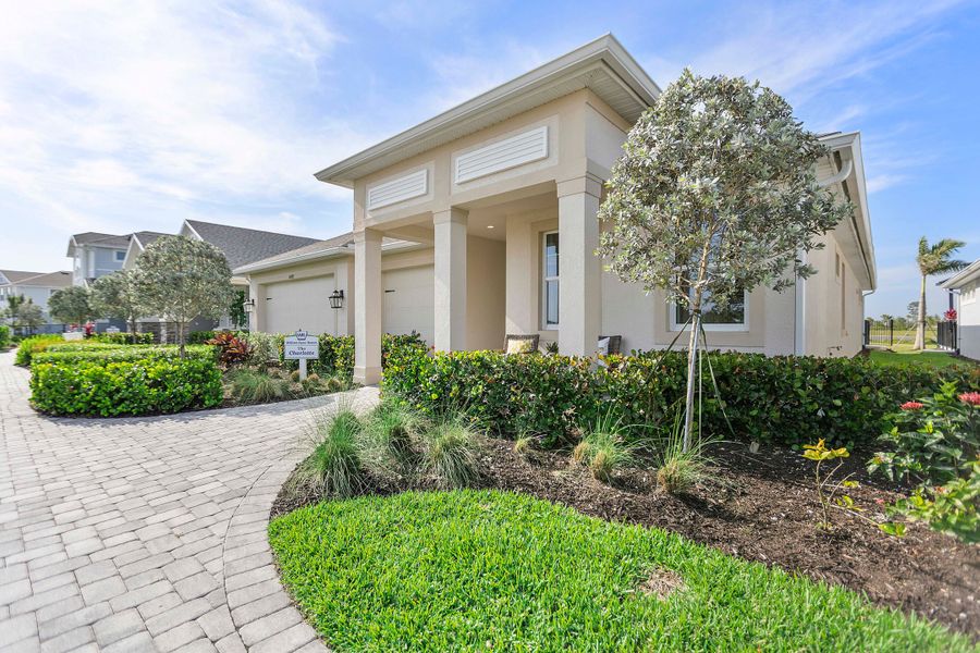 Representative exterior photo of a completed home built from the Charlotte by William Ryan Homes in The Sanctuary – Royal Collection, Punta Gorda, FL (Image 25). Representative exterior photo of a completed home built from the Charlotte by William Ryan Homes in The Sanctuary – Royal Collection, Punta Gorda, FL (Image 25).
