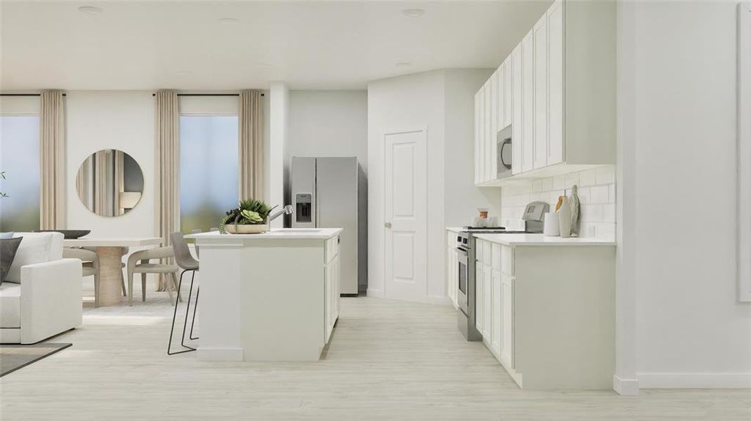 Kitchen featuring white cabinets, stainless steel appliances, backsplash, a center island, and light wood-type flooring Kitchen featuring white cabinets, stainless steel appliances, backsplash, a center island, and light wood-type flooring