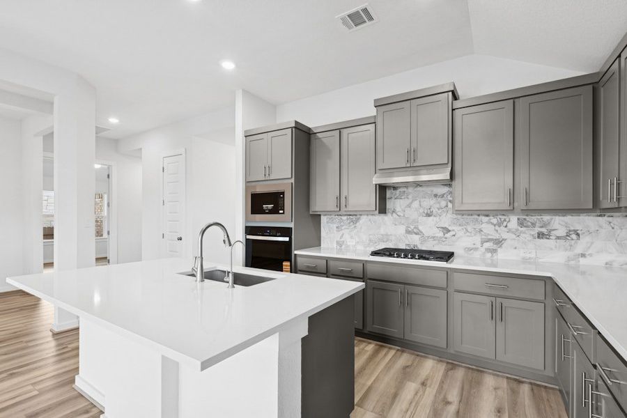 Furnished interior view inside a new home in The Colony, Bastrop (Image 9).
