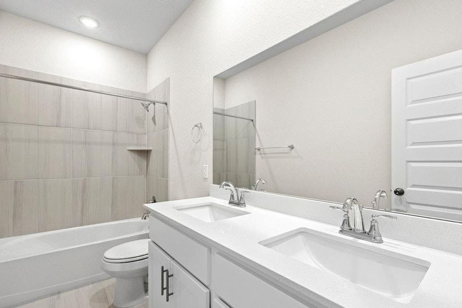 Furnished interior view inside a new home in Santa Rita Ranch, Liberty Hill (Image 8). Furnished interior view inside a new home in Santa Rita Ranch, Liberty Hill (Image 8).